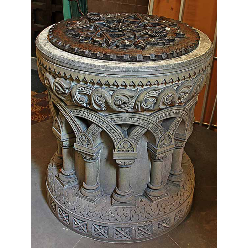the medieval church was latest re-built and fitted in the mid-19thC in what Pevsner called a "hamfisted Norman" style -- this is the font in use