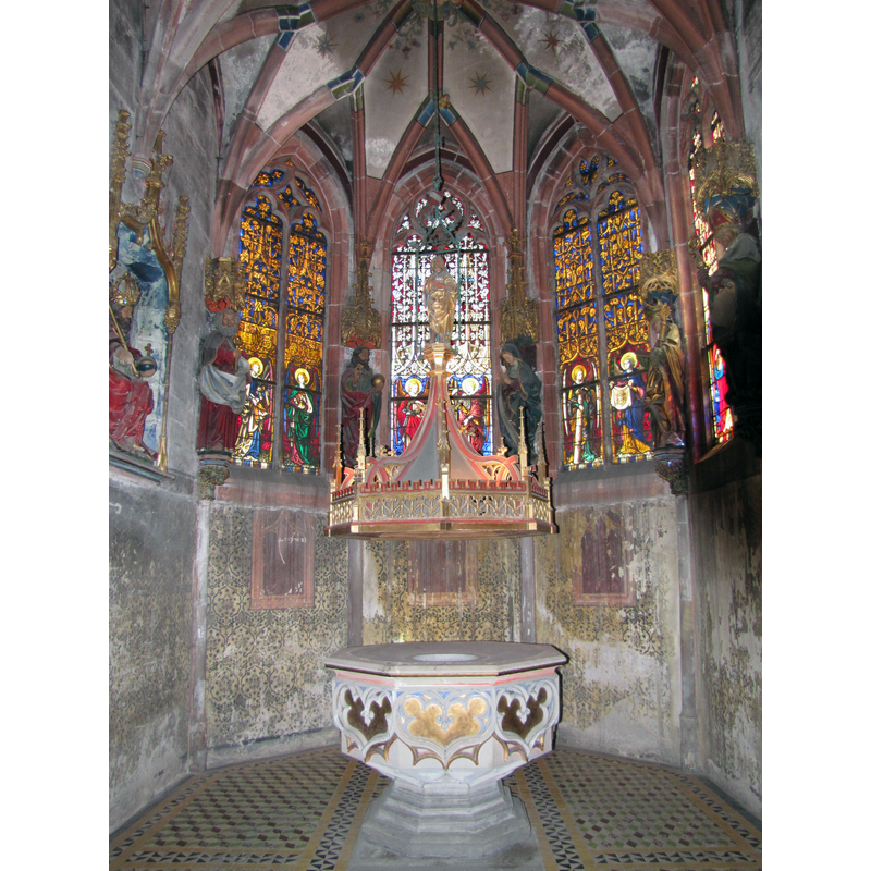 Source caption: "Chapelle de la Trinité avec fonts baptismaux du XVe".