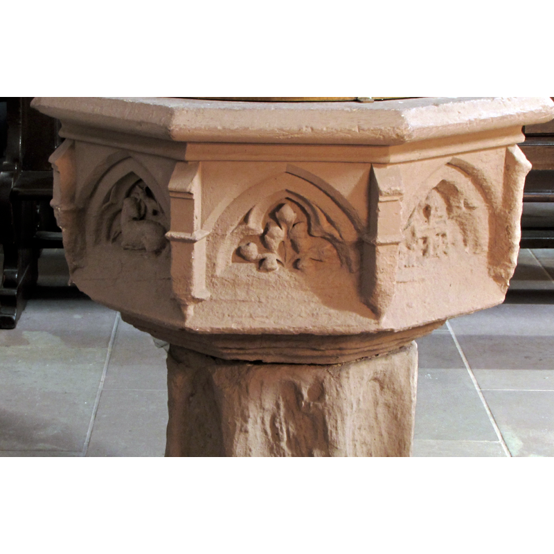 the font in the Catholic area of the interior: seen here in the left arch
