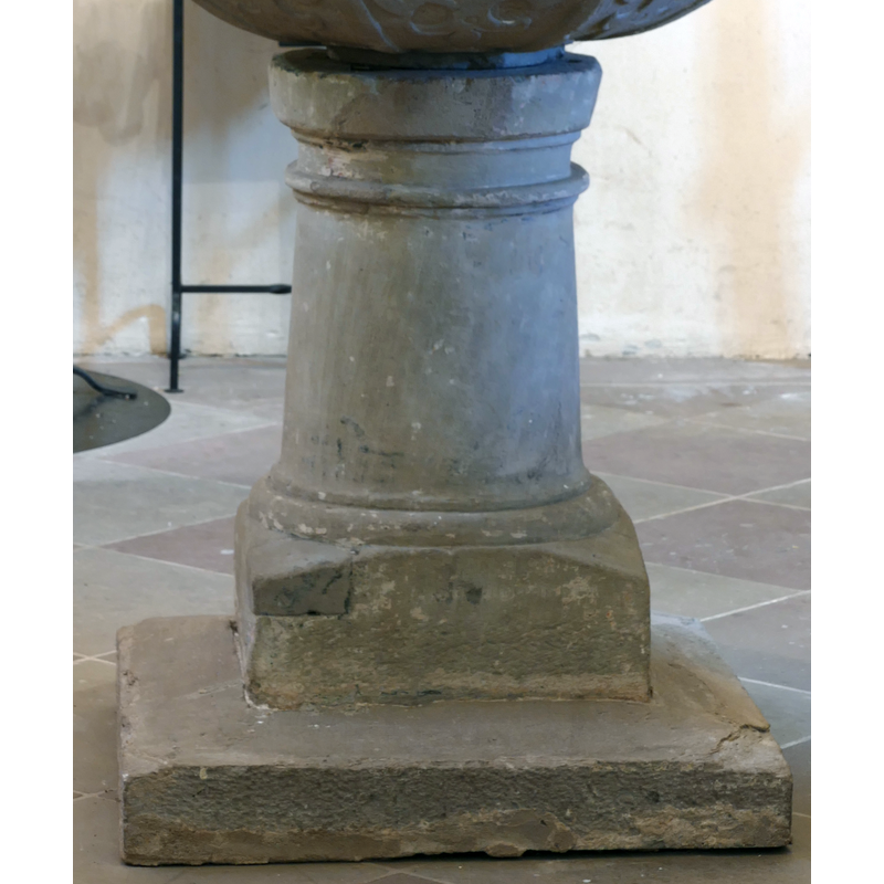 several, at both ends of the stem of the base -- notice the repair to the left angle of the lower base