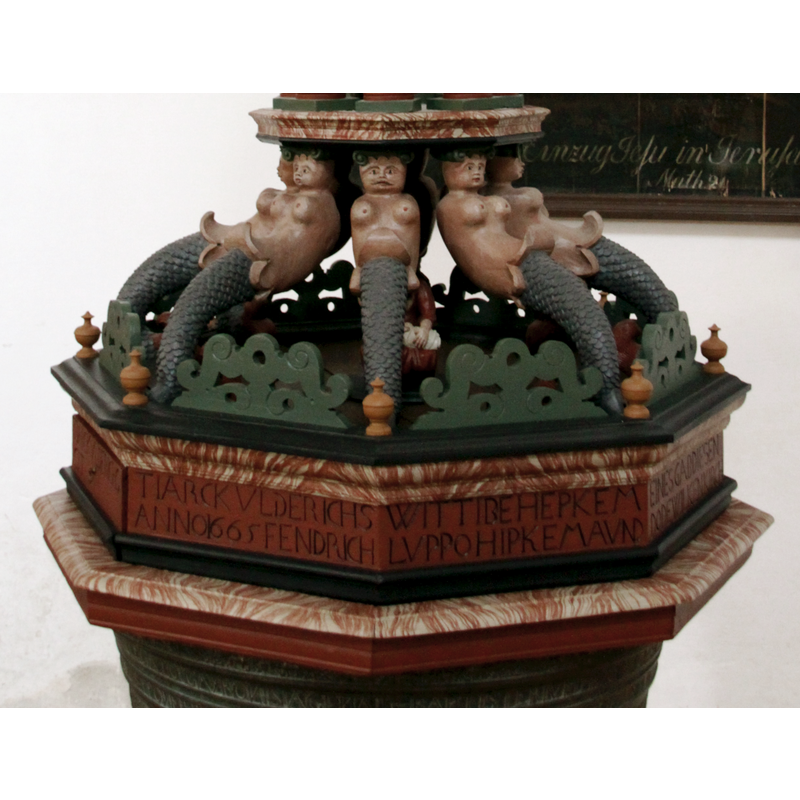 including the eight sirens and the inscription with the date below