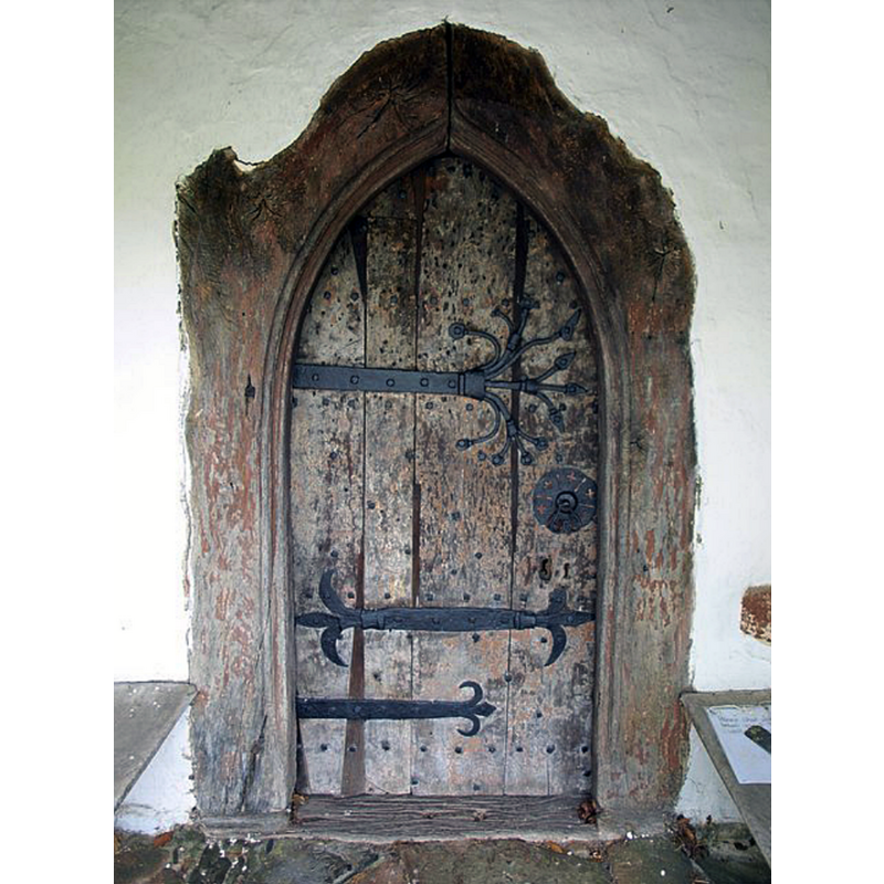 Source caption: "This door in the porch of [...] St Michael's church, Raddington, with its fine iron strap hinges and back-plates, dates from 1350-1370."