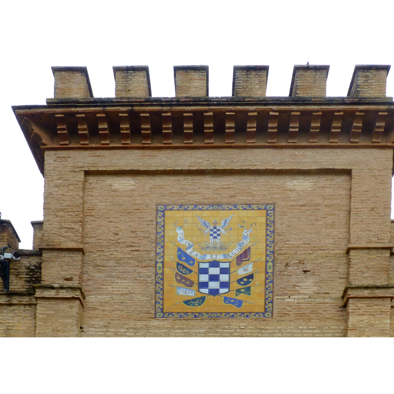 coat of arms on the monastery wall, near the church