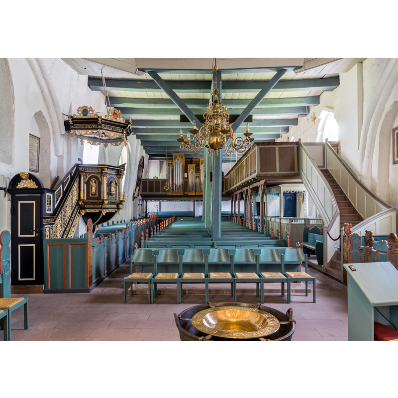 with a view of the font and the baptismal dish in the foreground