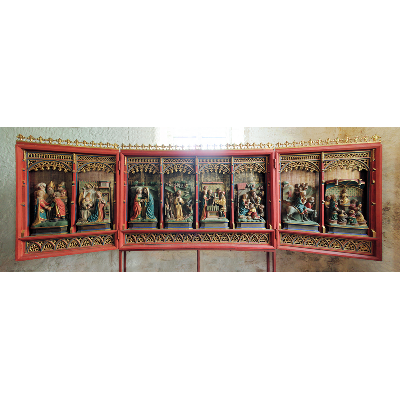 Source caption: "Der Lüderskoper Altar" -- formerly the retable of the main altar, now displayed against the north wall of the nave, near the west gallery