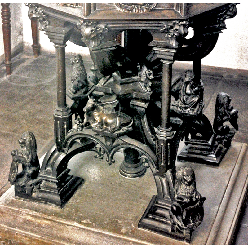 an odd assemly of the four symbols of the Evangelists at the centre of the base structure, on little raised platforms