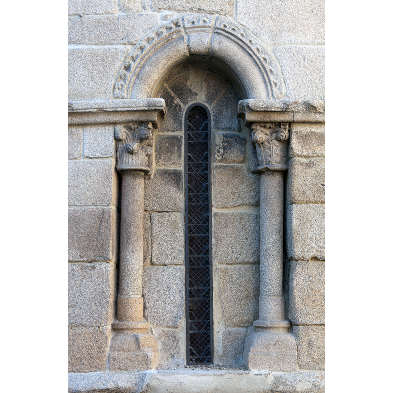 one of several windows in the apse; this one has foliated capitals