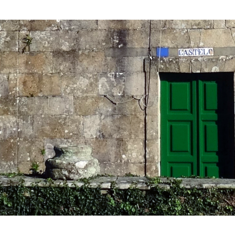 the object on the left [north] side of the west entranceway appears to be the base of an old font, and has a drain hole atop, in the centre; the shape does not appear to match the wall-mounted font, this one appearing to be of an earlier design and probably and earlier date as well