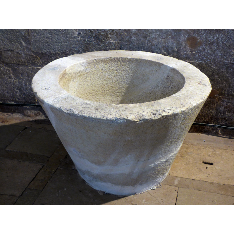 the old font, now [May 2018] repaired and re-located inside the church