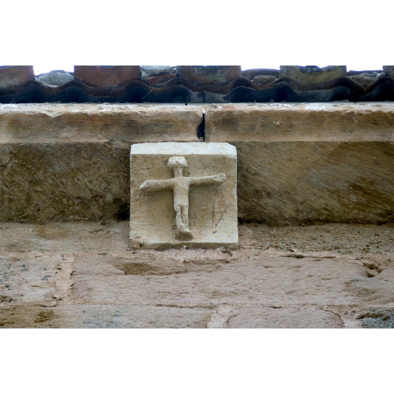 this Crucifixion corbel is located above the exterior window of the chancel