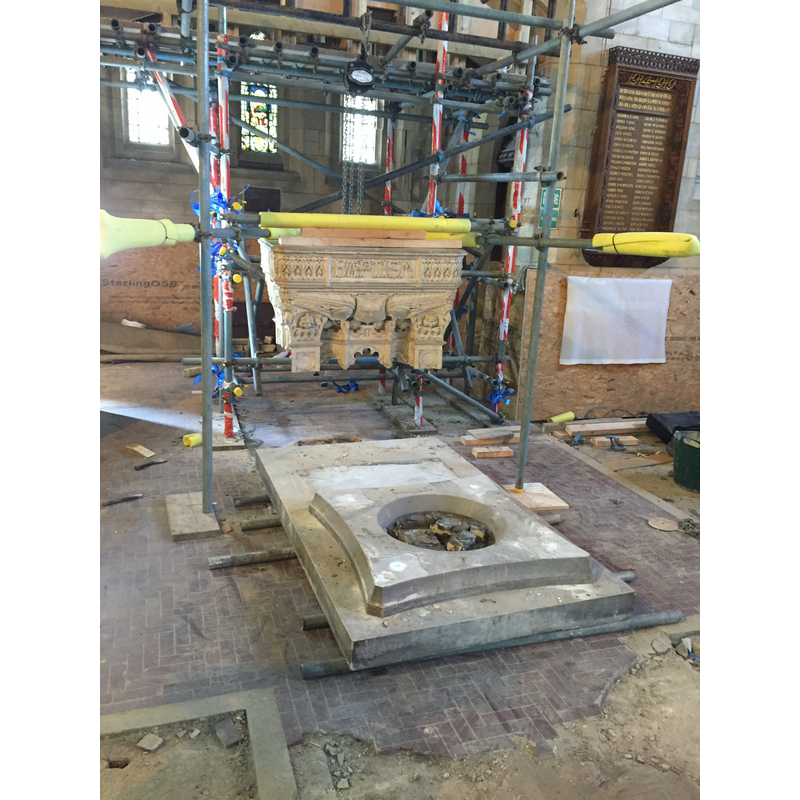 the plinth is in place; the top of the modern font is being prepared to go oneto it
