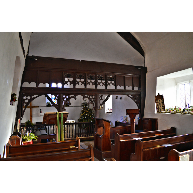 Source caption: "The interior, Aylton church. There is no dedication to this humble little building, but it has charm and interest in quantity. The screen is quite unique."
