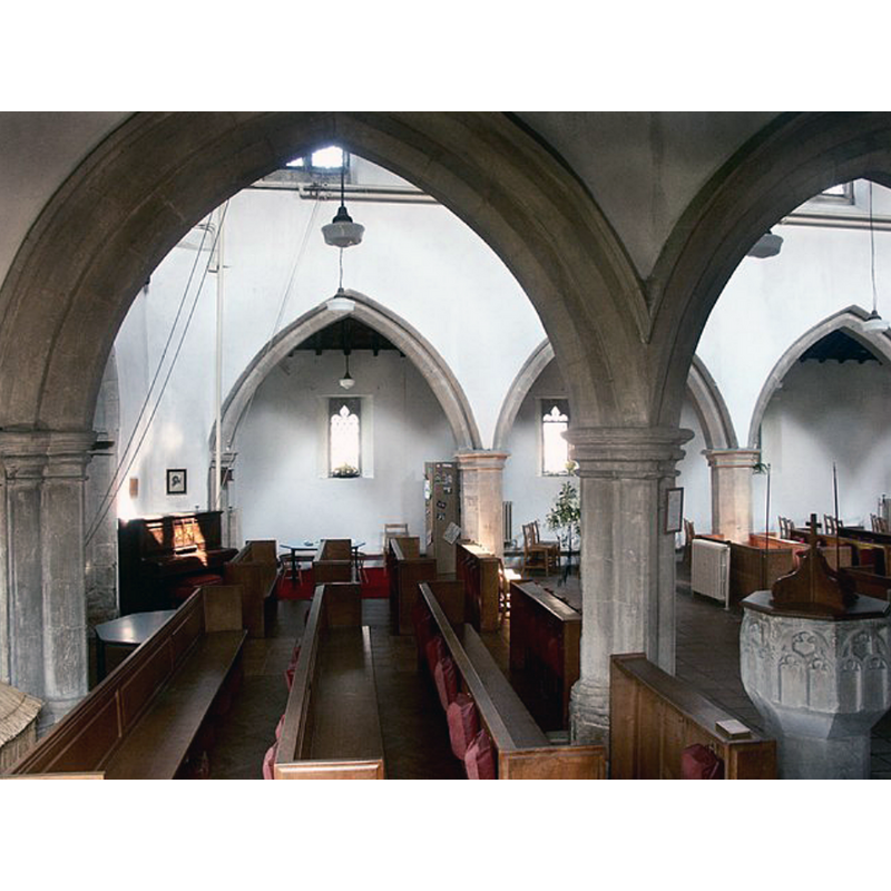the font is partially visible in the foreground, right side; view across to the north aisle