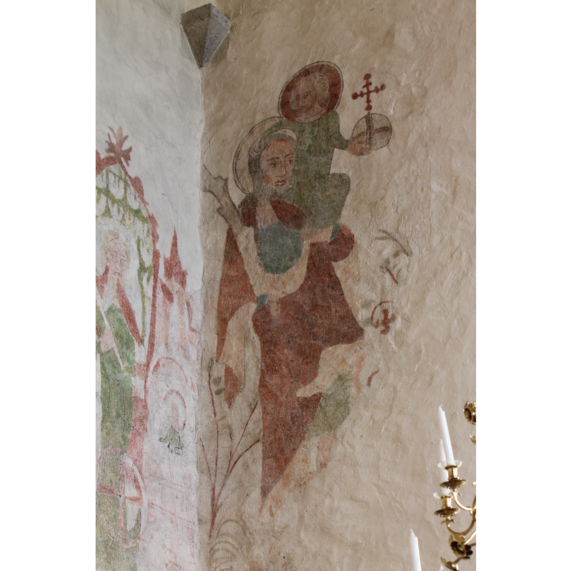 the Modonna and Child are painted on the northwest side of the chancel arch; the figure partially visile on the north wall is St. Catherine of Alexandria