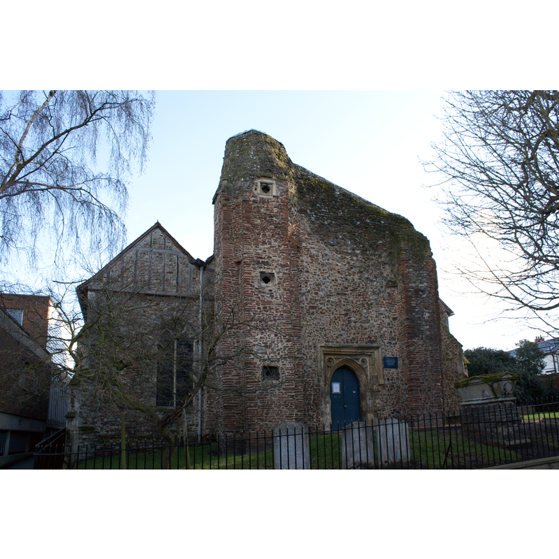 Source caption: "St. Martin's Church, located in the Dutch Quarters of Colchester, Essex. The Church dates from the Norman times, but the tower was destroyed during the English Civil War, and was never repaired. The Church is largely disused these days."