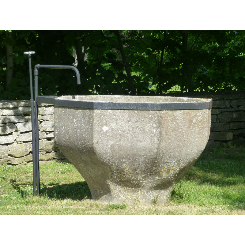 a large octagonal stone basin now [May 2018] serving as water-trough