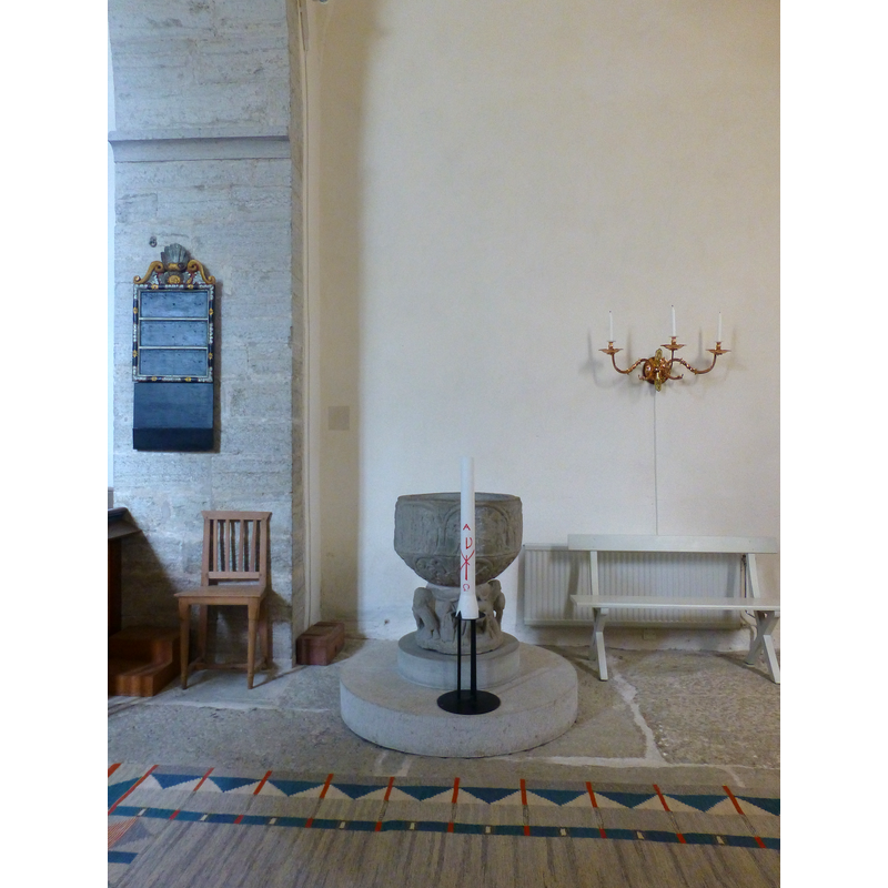 by the north side of the chancel arch