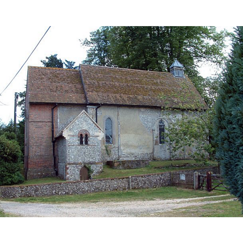 Source caption: "Corhampton Church, Hampshire. A late-Saxon church on a bank above the A32. In the south wall there is a Saxon sundial. The photograph shows the north wall of the undedicated church."