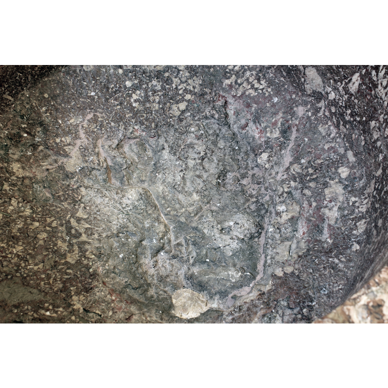 the crudeness of the bottom surface would suggest that either the work weas left unfinished, or that an insert was used for baptisms