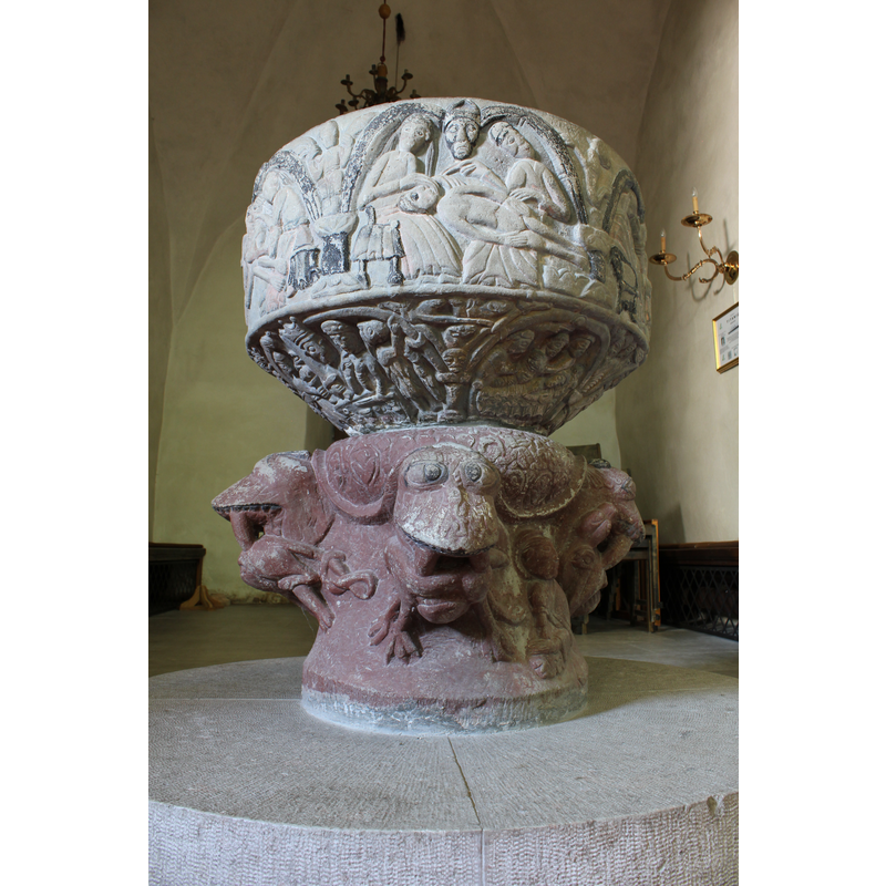 showing the creation of Adam on the basin side