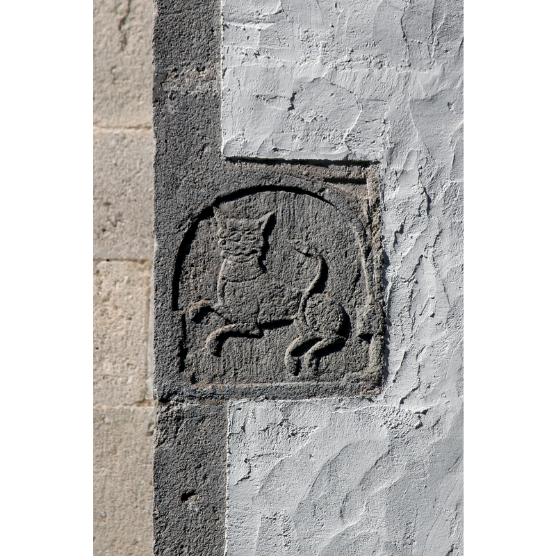 above and to the left of the southwest portal
