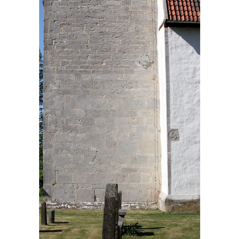 located on the south wall, just east of the tower, to the left of the southwest portal