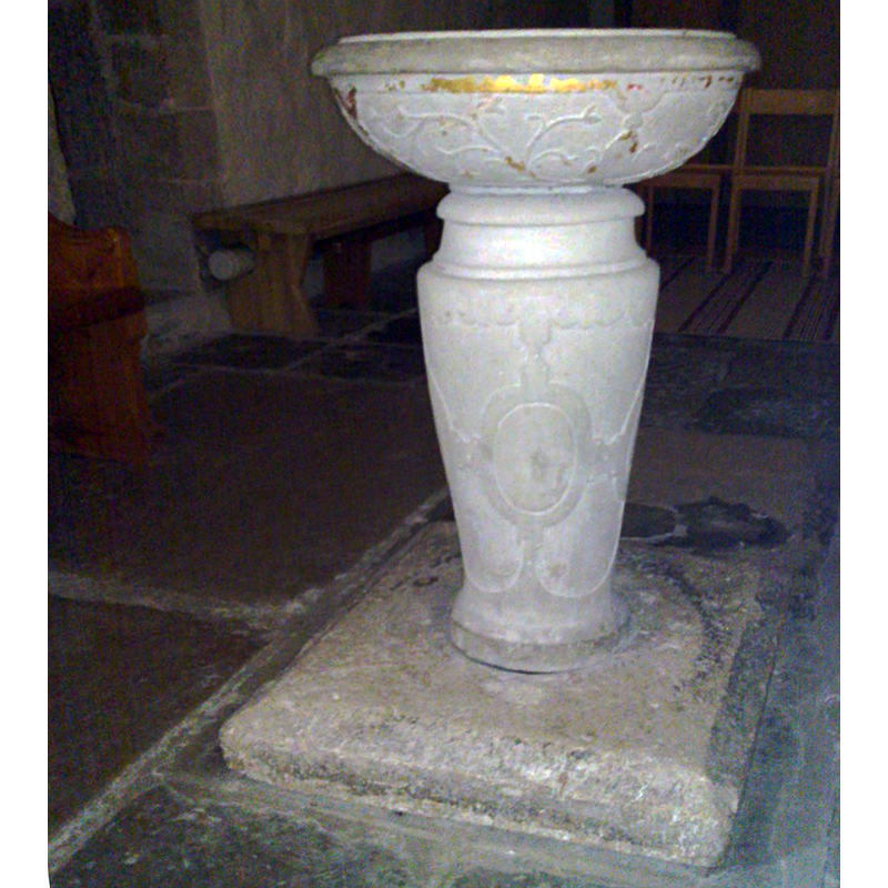 the 17thC (?)  font at the west end of the nave