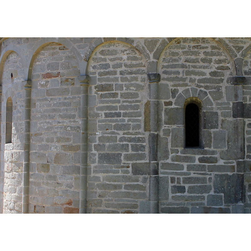 two of the three windows in the apse are visible here
