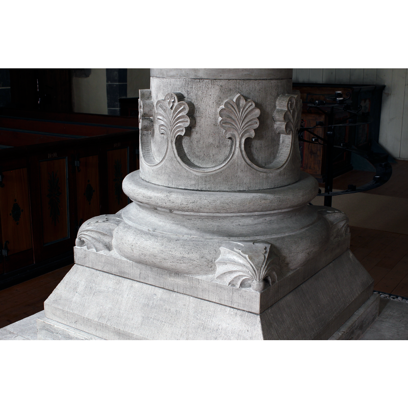 the base of the central pillar in the nave
