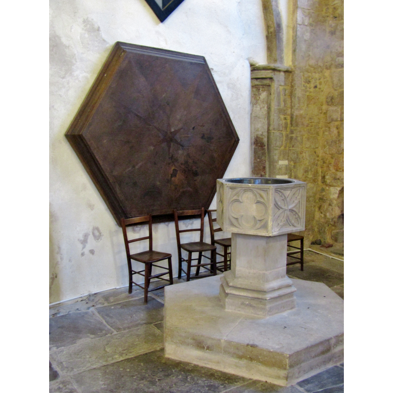 the large wooden octagon on the back wall is the sounding board of an earlier pulpit