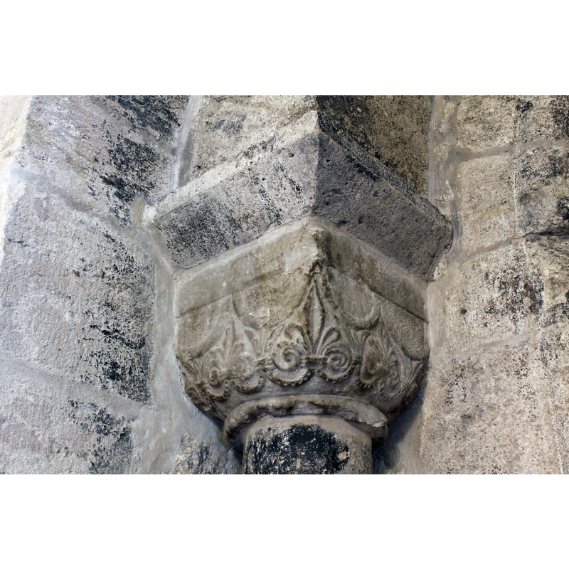 originally an exterior portal? 13thC; carved capital on the left side; the one on the right side is plain