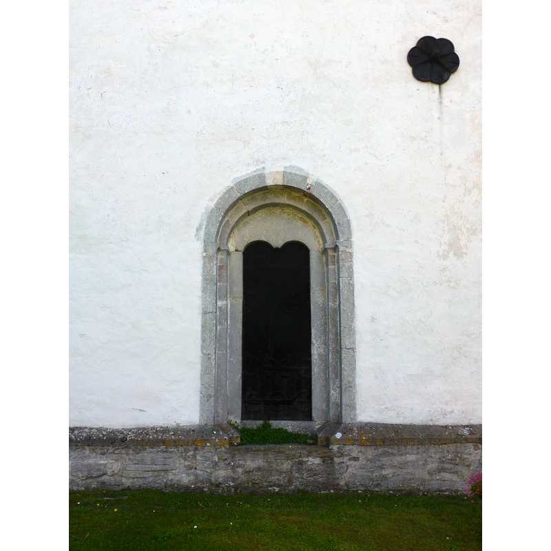 showing the north portal; it opens into the west end of the nave from the north side