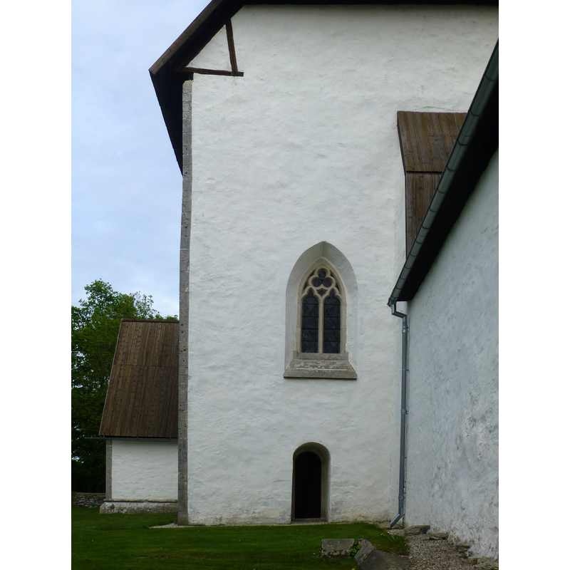 the west wall of the nave, north side; the low small protrusion on the left is the sacristy