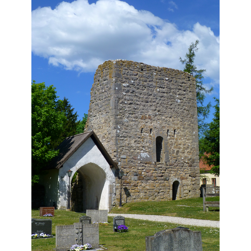 one of the lychgates, and the ruins of the 12thC defensive tower