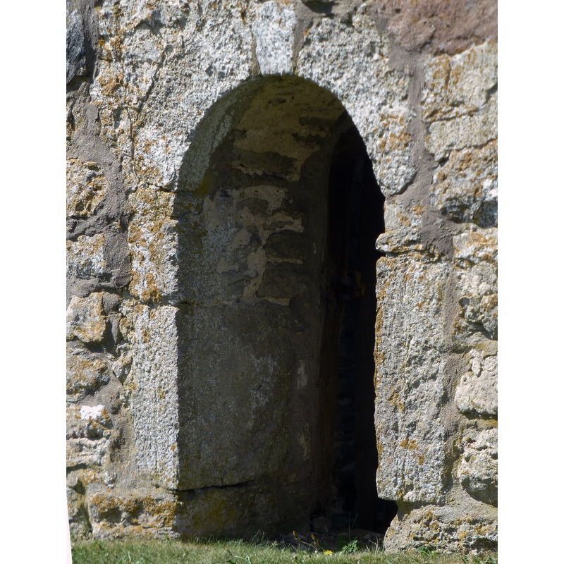 ruins of the 12thC defensive tower to the west of the present church