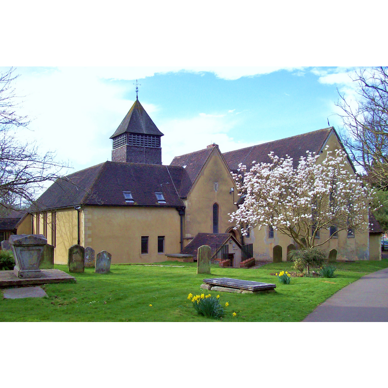 Source caption: "On the night of 5th May 1979 St Peter's Church, Yateley, was burnt down for a second time, this time by an arsonist, leaving only the walls, the charred timbers of the tower and the cracked bells In the rebuilding of the church, great care was taken to save what could be preserved and at the same time to enlarge and modernise the building, extending some 25 feet into the churchyard on the south side. Single lines of darker tiles in the current church floor show approximately where the south wall of the Saxon church was and also the line of the south wall of St. Peter's before the fire. Two and a half years after the fire, the new St. Peter's was consecrated by the Bishop of Winchester on the 21st November 1981."