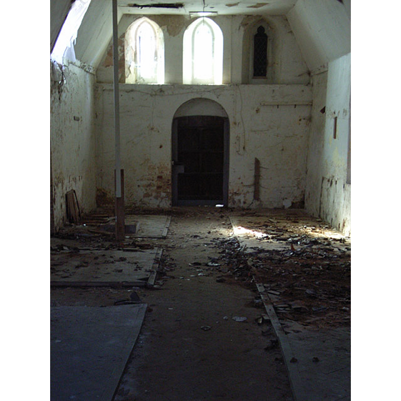 Source caption: "All Saints' parish church, Stratfield Turgis, Hampshire: inside the derelict church, looking west".