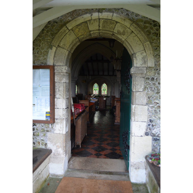 Source caption: "Norman doorway re-used in the north porch of St Lawrence's parish church, Weston Patrick, Hampshire".
