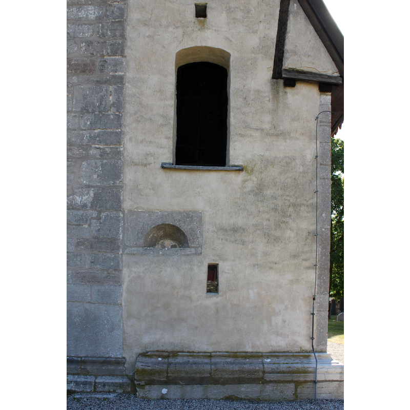 the front [west] side of the later addition to the southwest end of the church