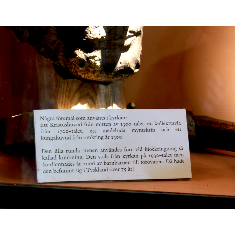a display case containing an assortment of remains from the old church