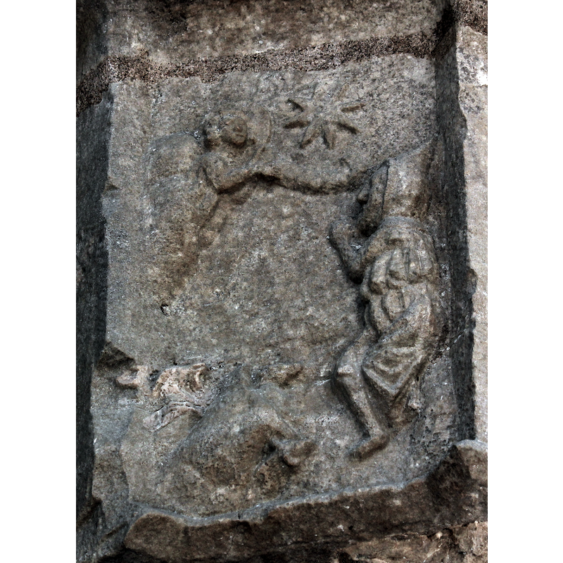 Annunciation to the Shepherds: haloed angel coming out of a starred cloud above; hooded shepherd on the right; the confusing bulk in the bottom left side could be a sheep in/by a bush