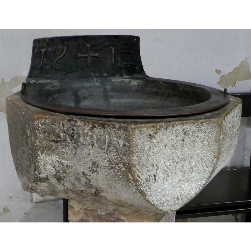 [cf. Inscription area] -- notice the metal insert and the inscription on it