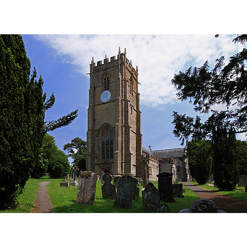 Source caption: "Whitchurch Canonicorum: Parish Church of St Candida and Holy Cross. Dating from the C12, it incorporates much from later periods, principally the C13, C14 and C15. Its glory is the C15 west tower of four stages."
