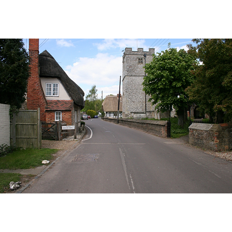 Source caption: "St Mary Bourne. Looking northwest along the B3048 with St Peter's Church on the right."