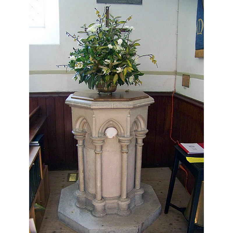 Source caption: "Church interior, St Peter in the Wood. The octagonal font is Victorian."