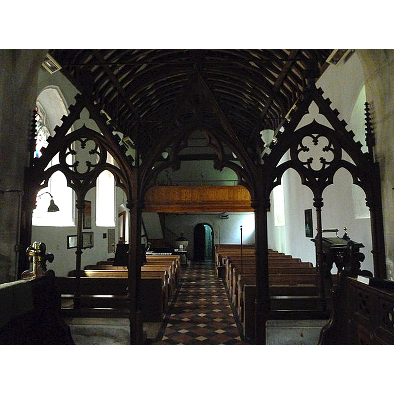 Source caption: "Saint Swithun, Headbourne Worthy: looking from the chancel into the nave" -- the font and cover are visible at the far end, just left [south] of the west entranceway