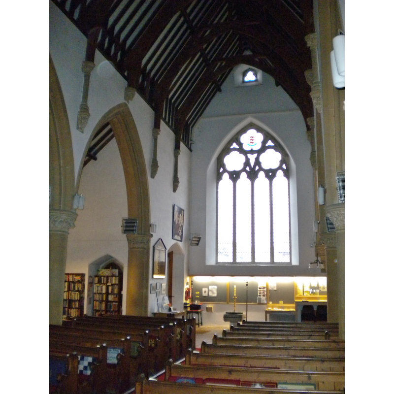 the interior of the new church with the old font at the fas [west] end