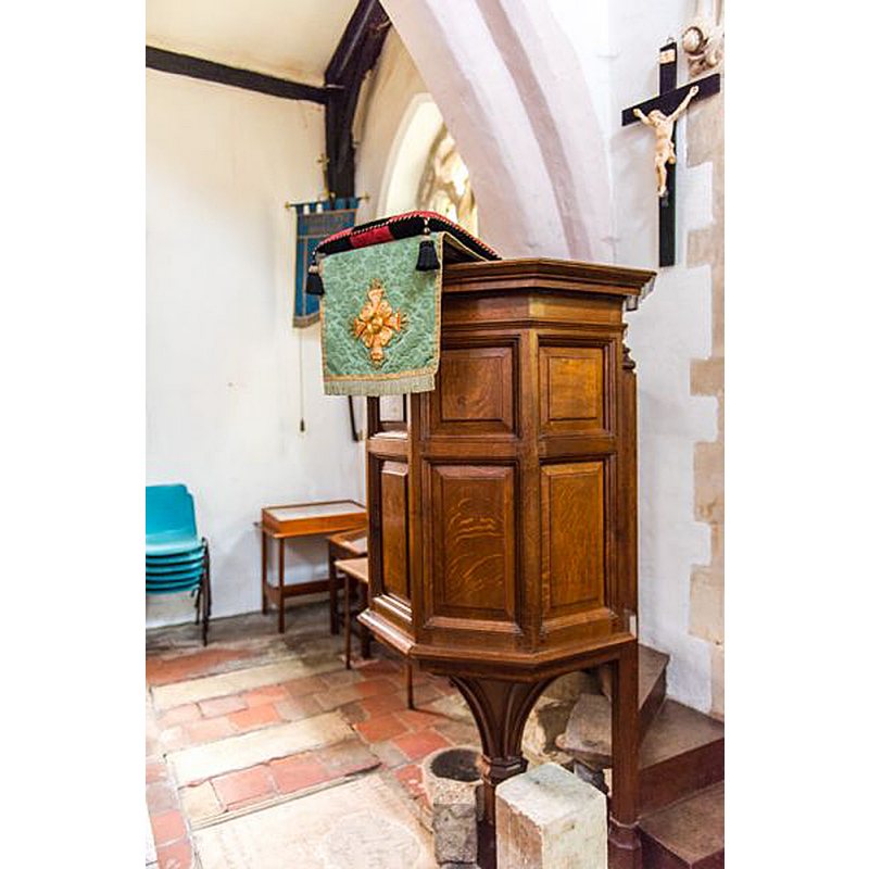 showing one of the objects of interest in this church at the foot of the pulpit