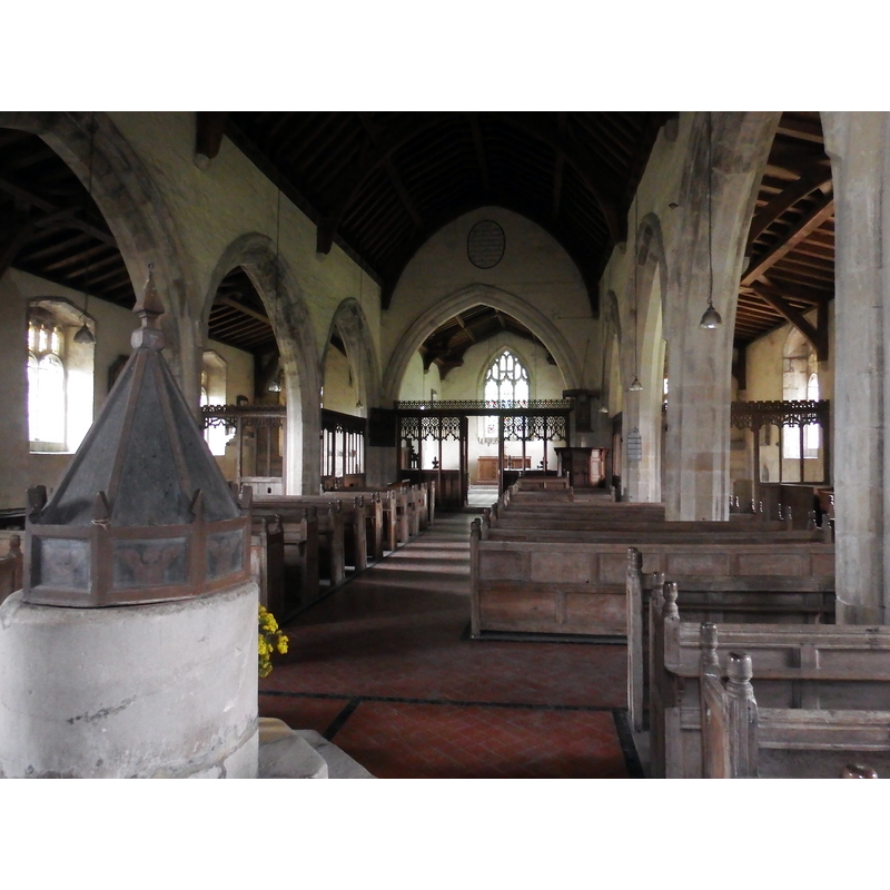 with the font and cover at the west end of the nave