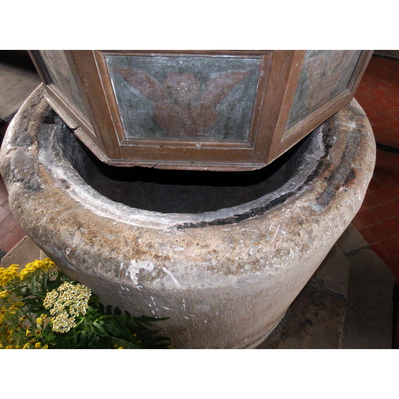 notice the repairs to the upper rim, the lead lining, the panels of the font cover...